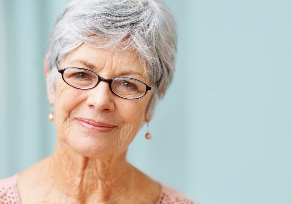 Closeup of a beautiful retired senior woman smiling