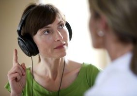 Mandatory Credit: Photo by Burger/Phanie / Rex Features ( 625955h )
Model released - woman undergoing pure-tone audiometry test and hearing threshold measurement.
Woman with doctor