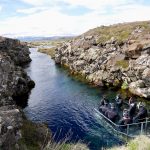 Scuba diving at Silfra rift, where Eurasian and American tectonic plate are divided in Thingvellir National Park, Iceland. High quality photo