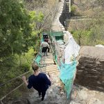 wall, cement, repairs, people walking down