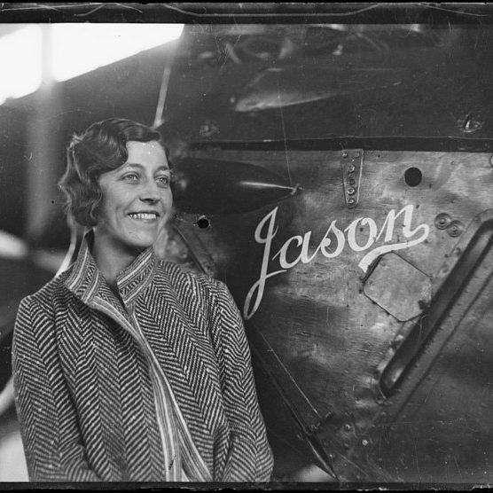 Amy next to  Jason her biplane, Australia