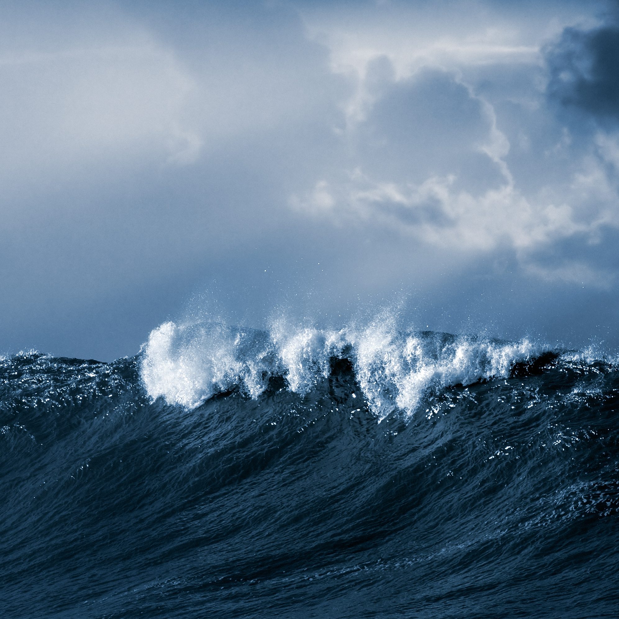 Big ocean wave crashes on the Protuguese coast - Toned black and white