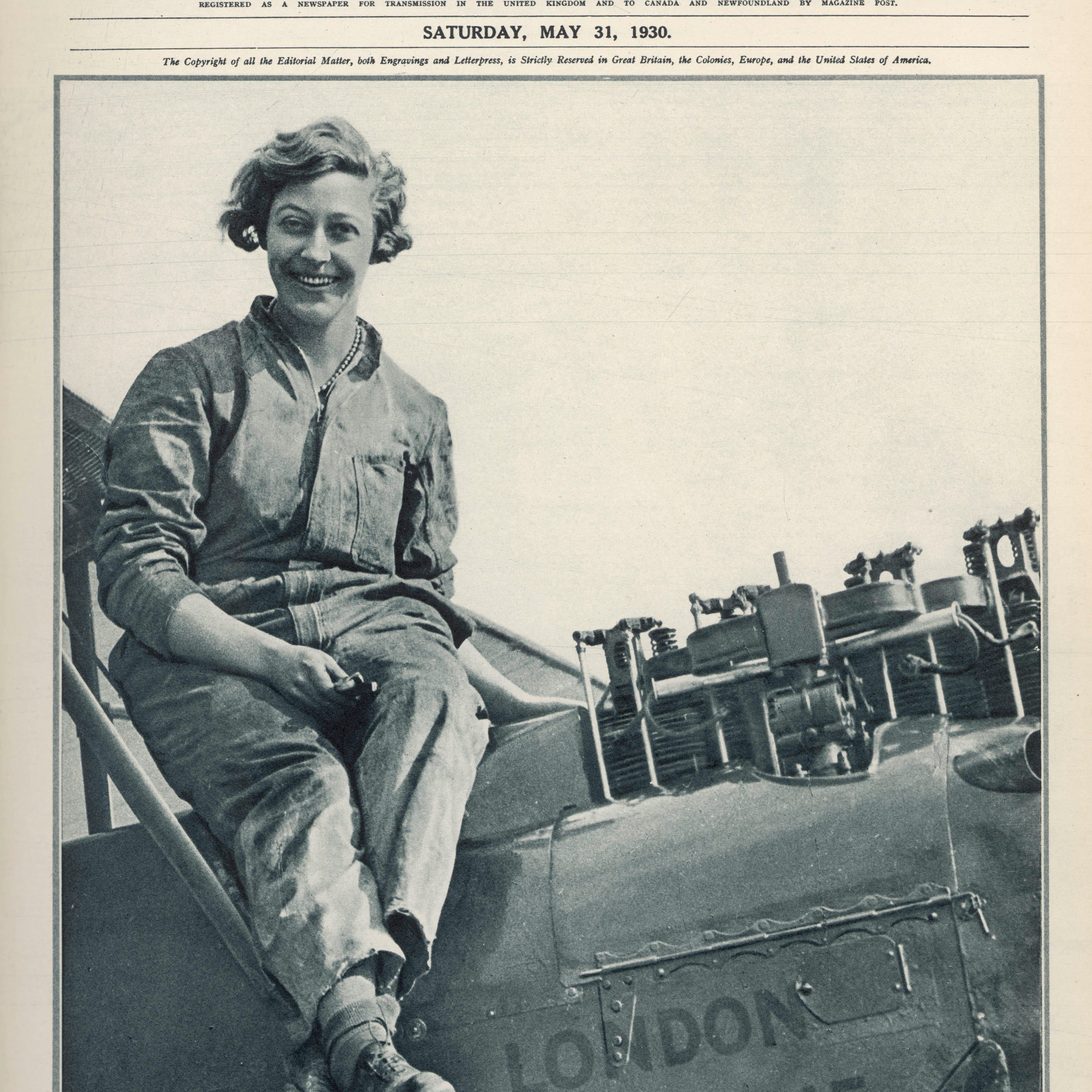 G3749P Miss Amy Johnson overhauling  her Gypsy Moth aeroplane after landing in Australia. She was the first woman pilot  to fly alone to Australia      Date: May 1930