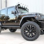 2015 jeep wrangler unlimited jk black right front angle