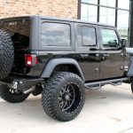 2019 jeep wrangler unlimited jl black right rear angle