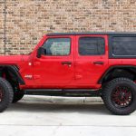 2018 jeep wrangler unlimited jl left side angle red