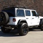 white 2019 jeep wrangler unlimited jl right rear angle