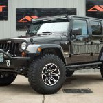 rugged brown 2013 jeep wrangler unlimited jk left front angle