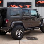 rugged brown 2013 jeep wrangler unlimited jk right rear angle