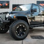 black 2016 jeep wrangler unlimited sahara jk left front angle