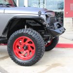 2016 Gray Wrapped JK Jeep 20x10 Fuel Vortex D637 wheels in custom candy red 35x13.50R20 Nitto Ridge Grappler tires