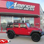 2017 Red JK Jeep 2.5″ Rough Country lift 18x9 XD 811 Rockstar II wheels in matte black 35" Nitto Trail Grappler M/T tires