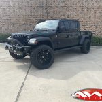 2020 Black Jeep Gladiator 2.5″ Rough Country lift 22×12 Hostile H114 "Fury" wheels asphalt 35″ tires left front angle