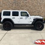 2020 JL Rubicon Jeep 2.5" lift 20×10 Moto Metal MO999 wheels gloss black with red milled accents 37″ tires stubby bumper