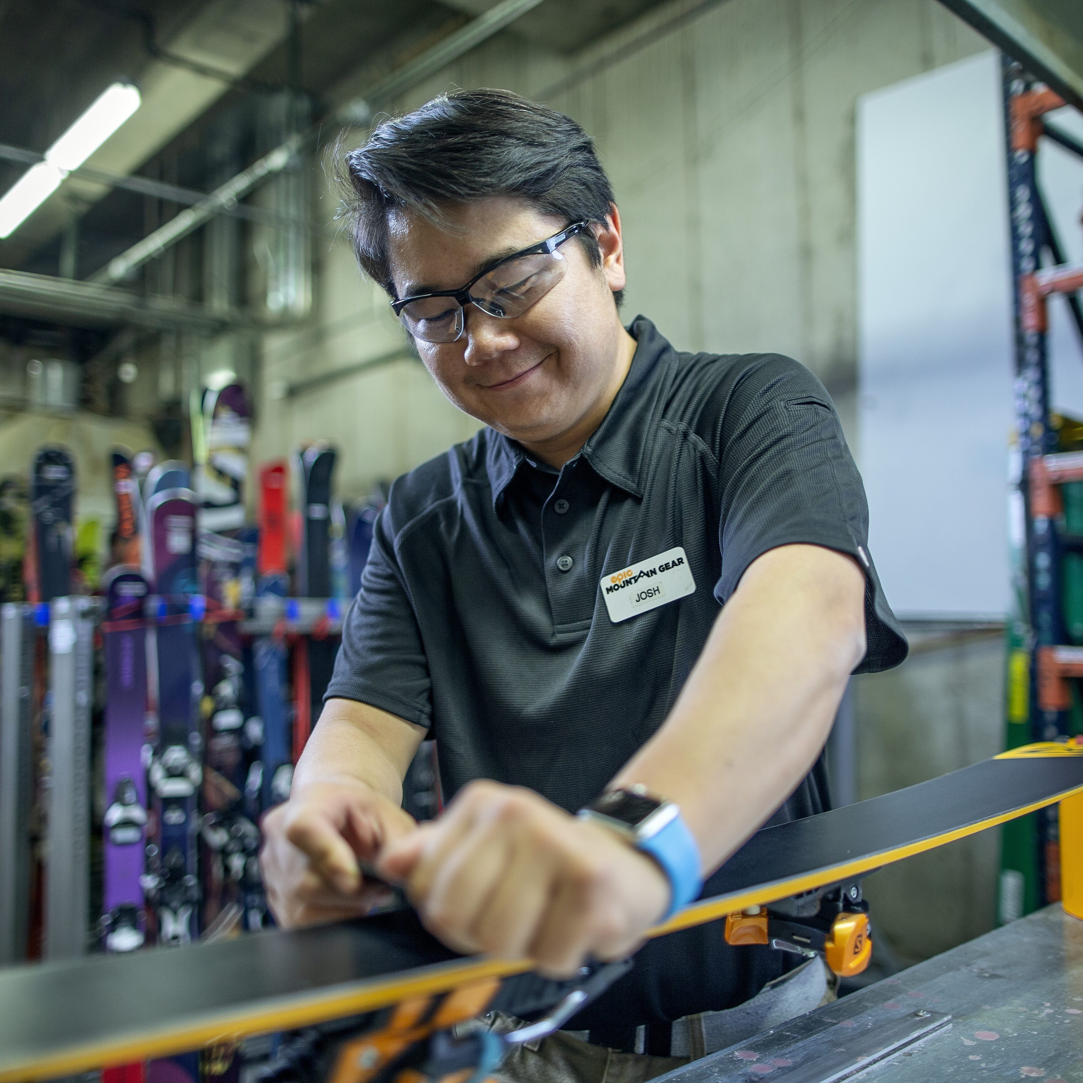 Ski tuning by an employee at Epic Mountain Gear
