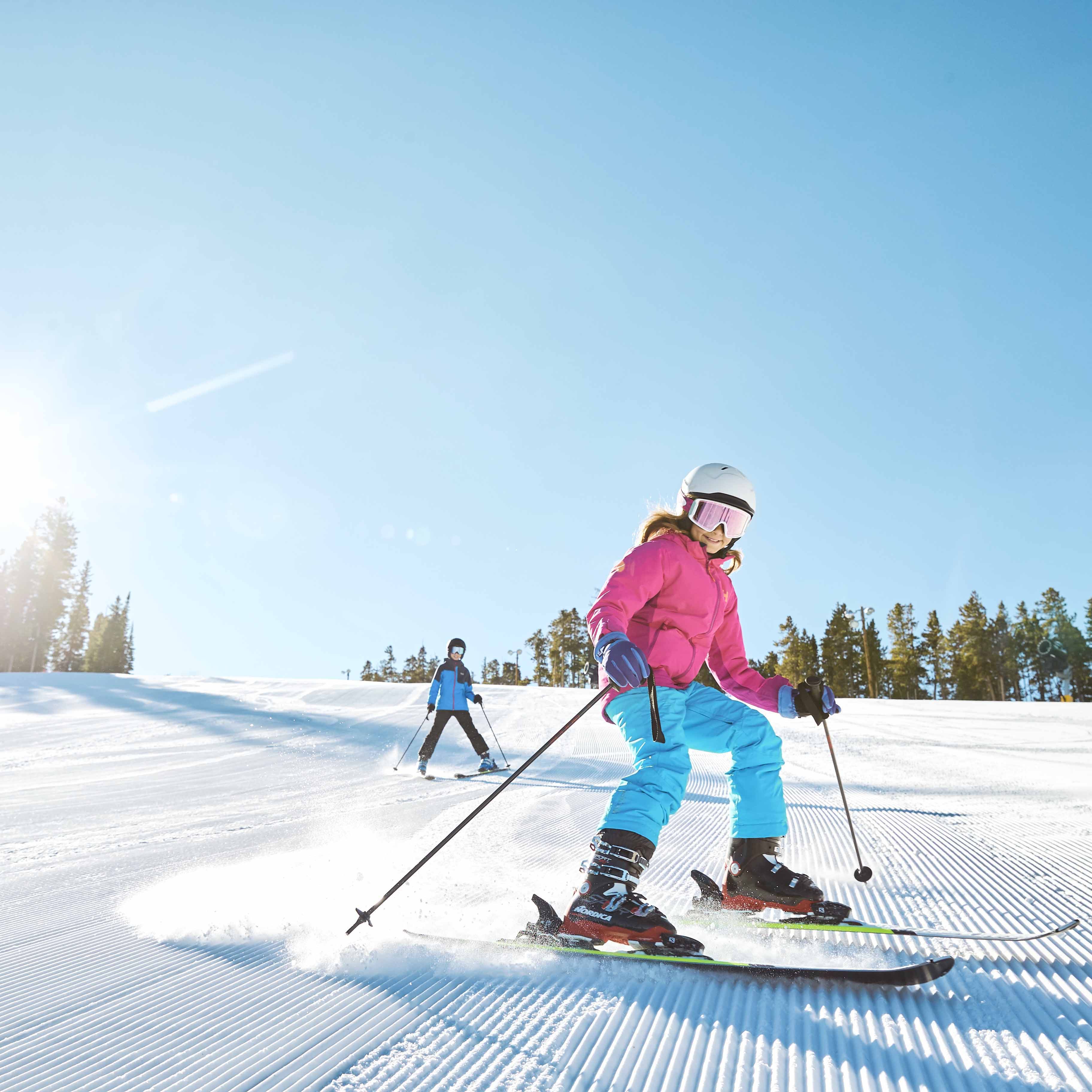 Family enjoys groomed run Schoolmarm at Keystone, CO.