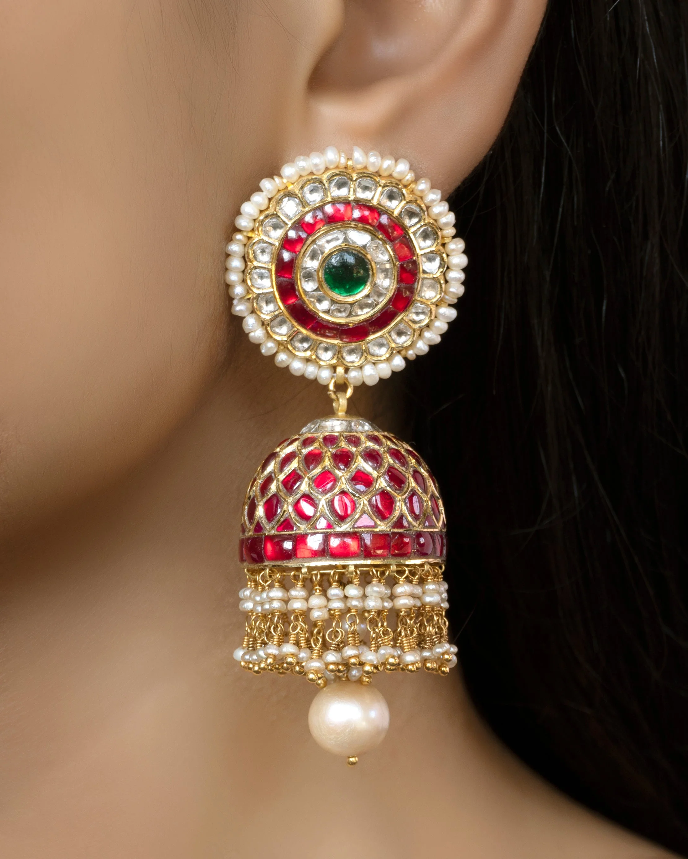 wearing jhumka earrings with lehenga